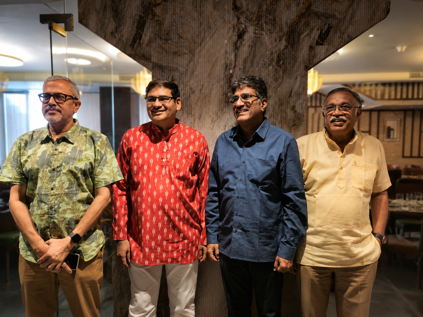 IXORA professionals collaborating in a modern office environment